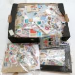 Box of mostly loose stamps (1000's) + the odd postcard / cover etc - 3.4kgs total weight