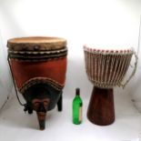 African Djembe drum t/w a hand carved native African drum with animal skin top & 3 carved mask