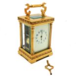 Antique large carriage clock with gong strike movement & ormoulu case with fluted column
