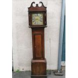 Antique oak and mahogany cased Grandfather clock with a brass and silvered dial bearing the name '