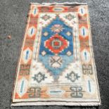 Aztec inspired designed carpet - 125cm x 206cm ~ has fading to 1 end