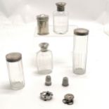 4 x silver topped jars (all slight a/f), silver peperette (6cm), 2 x silver thimbles (1