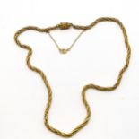 Unmarked gold (touch tests as higher than 9ct) hand made 38cm necklace / chain with later safety