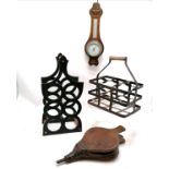 Antique steel bottle rack, vintage cast iron wine rack T/W a wall barometer and a pair of bellows.