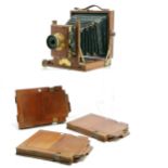 Antique mahogany & brass mounted bellows camera by B.C.C. (Boots Cash Chemist) with 3 developing