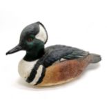 Carved painted wooden figure of a male hooded merganser - 31cm long and has a makers mark dated 2008