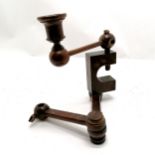 Antique walnut table clamp with candlestick attachment 20cm high.