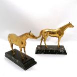 Pair of gilt metal horse figures 20cm long x 16cm high. Some losses to the finish