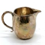 Antique silver cream jug hallmarked London 1808. 90g, 8.5cm high. Has dents to the body and base