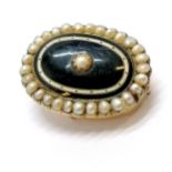 Antique yellow metal brooch with pearl & dark blue / white enamel - 2.6cm across & lacks pin &
