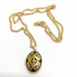 9ct hallmarked gold locket with celtic design on a 9ct hallmarked gold 44cm chain - total weight 4.