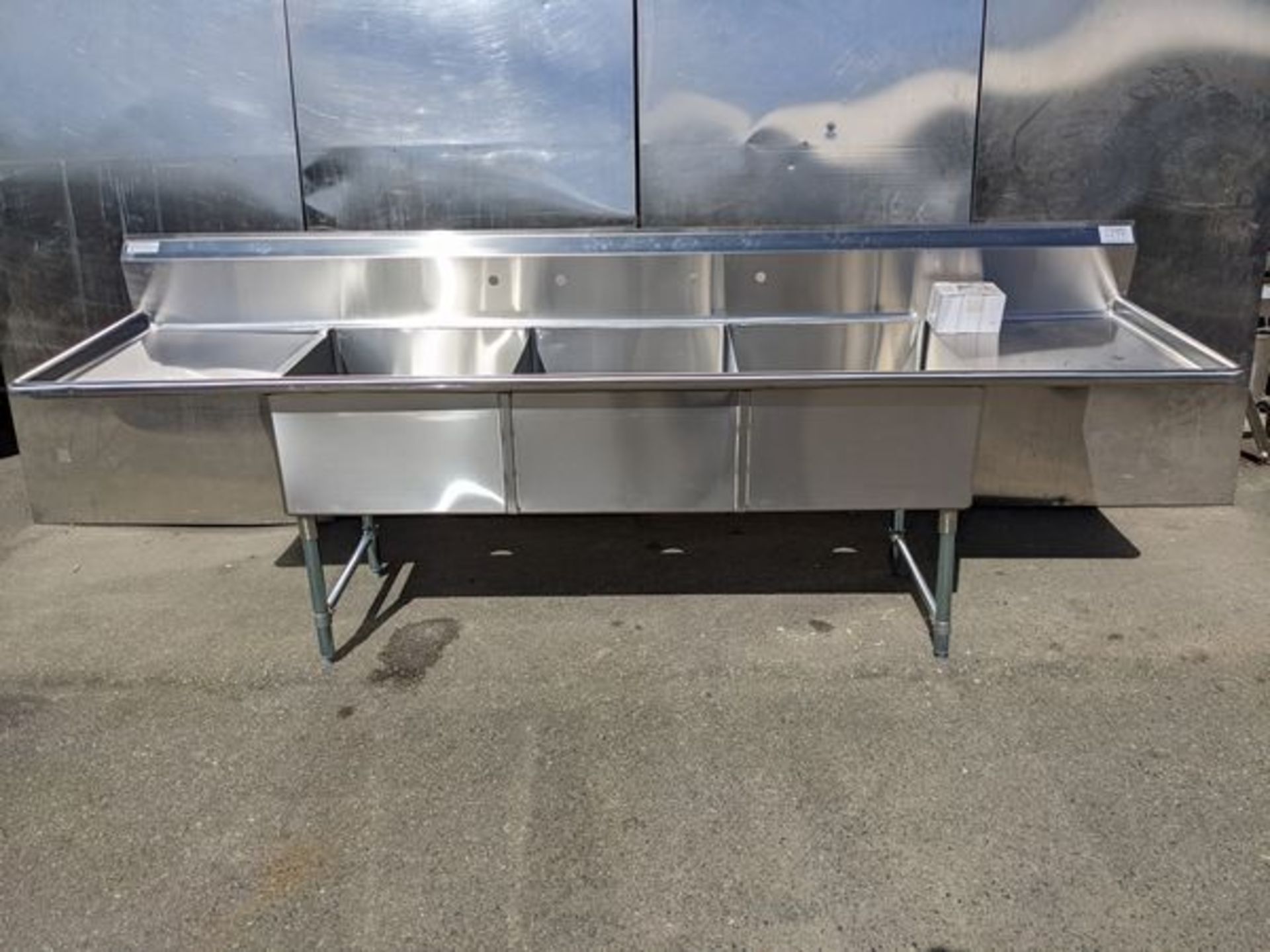 Unused 3 Well Stainless Steel Sink with Left and Right Run Off