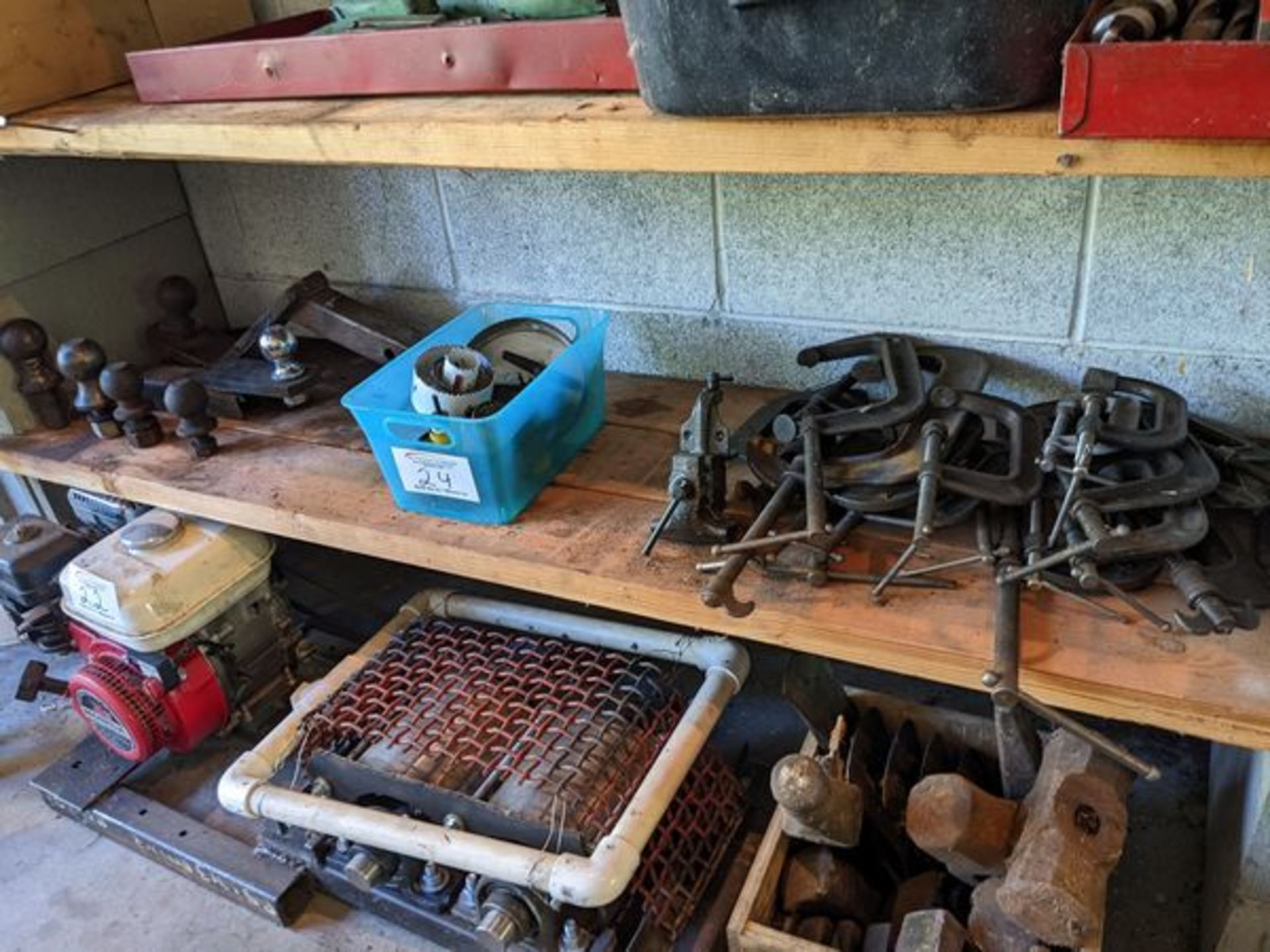 Shelf lot of C-Clamps, Trailer Hitches, Hole Saws, etc.