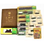 MINITRIX; an N gauge 2914 locomotive, with a maroon coloured carriage and three wagons, with a