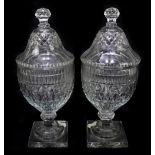 A pair of 19th century cut glass sweetmeat jars and covers with diamond cut decoration, height
