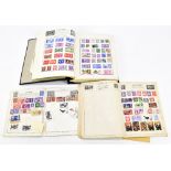 A Meteor blue stamp album and a collection of loose stamps