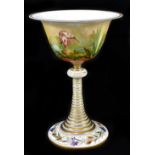 A late 19th century Bohemian opaque glass, gilded and painted chalice with flared rim, the bowl