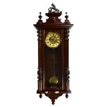 A reproduction Vienna style wall clock with Roman numerals to the painted dial, height approx