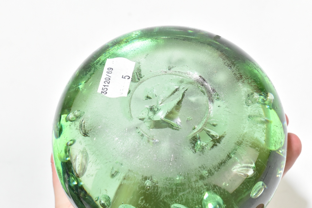 Five Victorian green glass dump weights comprising three examples with internal bubbles and two with - Image 7 of 7