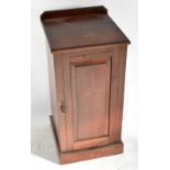 A late Victorian single door bedside cupboard.