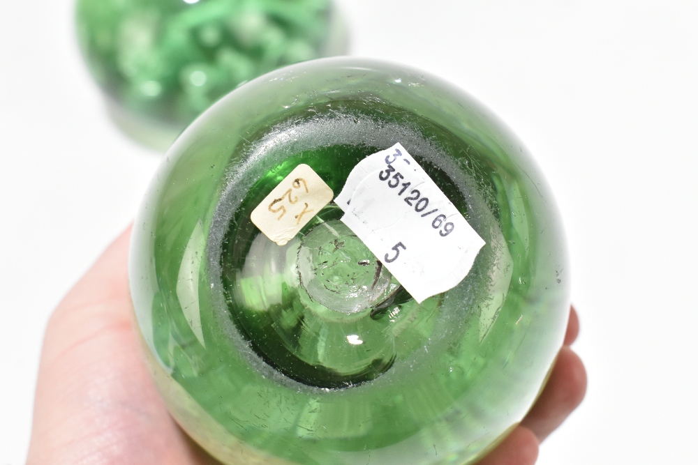 Five Victorian green glass dump weights comprising three examples with internal bubbles and two with - Image 6 of 7