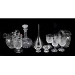 A collection of late 19th century and later glassware, including two jugs, a decanter, a pair of