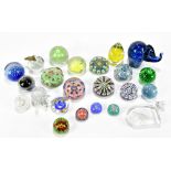 A collection of glass paperweights predominantly late 20th century.