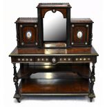 A late Victorian amboyna veneered ebony gilt metal and porcelain mounted bonheur de jour, the