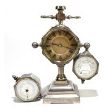 An unusual late 19th century French combination clock, barometer, thermometer and compass, in