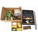 A small quantity of vintage gun cleaning equipment, including rods, brushes, Youngs 303, etc.