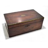 A 19th century brass bound rosewood and mahogany writing slope, the hinged cover enclosing a baize