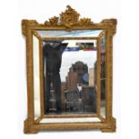 A 19th century parcel gilt framed Venetian style wall mirror, with central bevelled plate flanked by