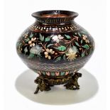 A 19th century treacle glazed vase on stand, the globular vase hand painted with floral detail,