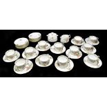 MINTONS; a thirty-eight piece part tea service, decorated in a' Lorraine' pattern.Additional