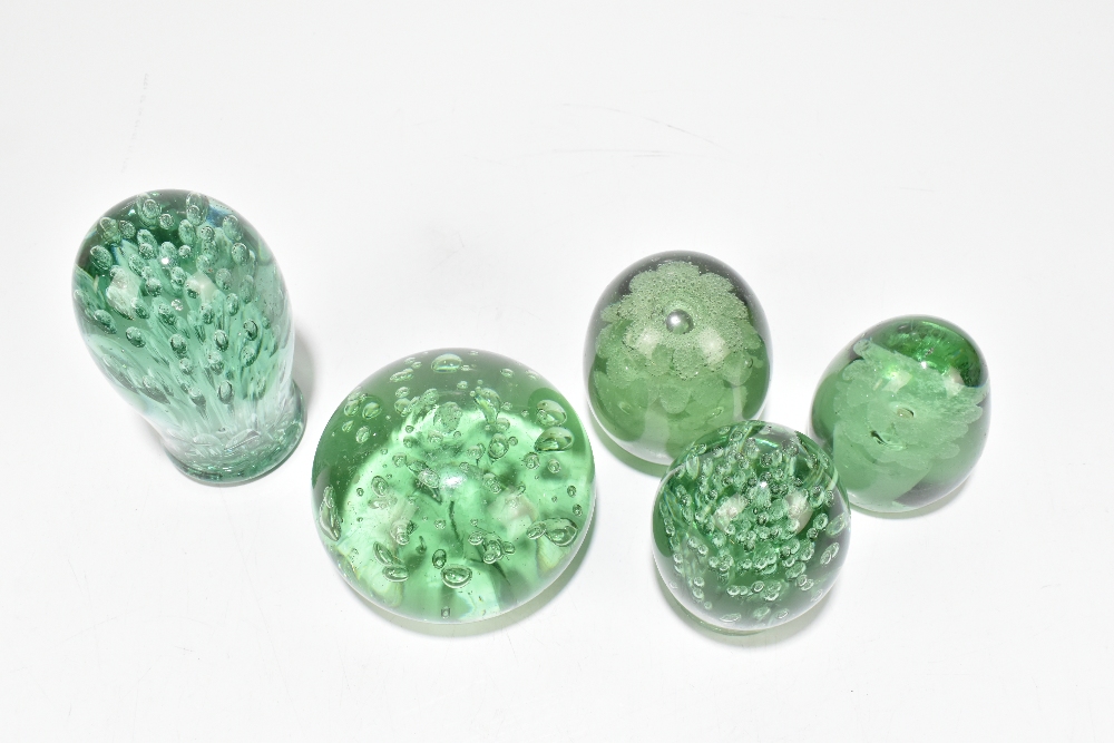 Five Victorian green glass dump weights comprising three examples with internal bubbles and two with - Image 2 of 7