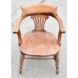 A smoker's bow back elbow chair with elm seat.  PROVENANCE: from the Brian Morley collection.  Brian