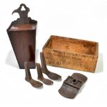 An 18th century mahogany candle box, height 43.5cm, together with three iron boot/shoe stretchers