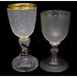 A late 19th century crackle glass goblet with moulded serpent to the single knop stem, height