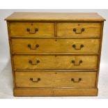 A late Victorian ash chest of two short and three long drawers raised on a moulded plinth, width