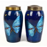 STOURBRIDGE; a pair of DG ware blue ground vases decorated with butterflies and with base metal