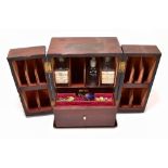 A 19th century mahogany apothecary cabinet, with two doors and recessed brass handle, the interior