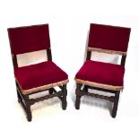 A set of four 17th century style oak dining chairs, with burgundy draylon upholstered backs and