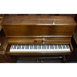 SQUIRE & LONGSON; a mahogany overstrung upright piano, length 135cm.