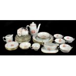 SPODE; a collection of 'Tradewinds' dinner and tea ware in red comprising seven large plates,