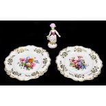 A pair of late 19th century Paris porcelain cabinet plates with hand painted floral detail inside