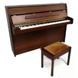 KEMBLE OF LONDON; an upright over strung piano, no.266750, width 149cm.