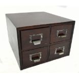 A four drawer filing chest.