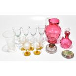 A collection of 19th century and later glassware including a cranberry jug with ribbed detail,