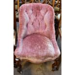 A Victorian pink upholstered nursing chair, height 75cm.