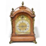 WINTERHALDER & HOFMEIER; an early 20th century oak cased quarter striking mantel clock, the brass